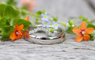 Wedding rings wild flowers